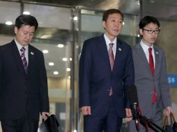 Kim Ki-Woong (c) asegura que se esforzará para lograr resultados aceptables para los ciudadanos. EFE /