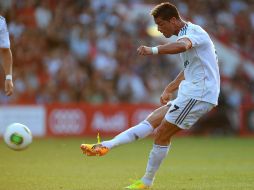 Ronaldo y Messi estarán frente a frente en busca del premio al mejor delantero de la LIga española AP /