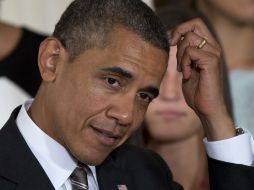 Barack Obama implementará nuevas medidas para que los cubanos puedan realizar visitas familiares o personales a EU. AP /