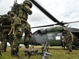 Fuerzas militares en conjunto con la policía detuvieron a los rebeldes en la capital colombiana. ARCHIVO /