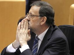 El presidente del Gobierno, Mariano Rajoy, escucha las intervenciones durante su comparecencia ante el pleno del Congreso español. EFE /