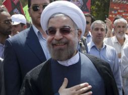 El presidente electo de Irán, Hasan Rohani, participa en una manifestación convocada para celebrar el Día Mundial de Al Quds. EFE /
