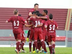 Jugadores del equipo emplumado festejan una anotación en la victoria de 2-0 sobre Lobos Buap. EL INFORMADOR /