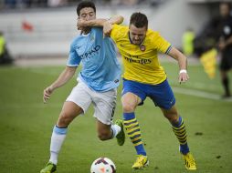 A una semana del inicio de la 'Premier', el marcador da confianza al equipo londinense, como dudas al City. AFP /