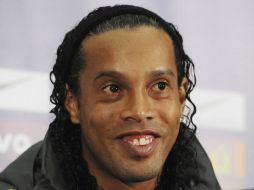 La característica dentadura del astro brasileño sufrió una transformación después de una cirugía estética. ARCHIVO /