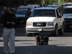 La Chevrolet Silverado blanca, placas JES-3619, donde viajaba la víctima del segundo homicidio de la colonia Heliodoro Hernández Loza.  /