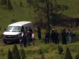 Servicios periciales buscan determinar su los cuerpos encontrados pertenecen a alguno de los desaparecidos en el ''Heaven''. XINHUA /