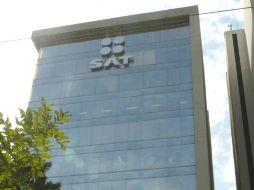 El SAT modificó en mayo los criterios para que los contribuyentes que ganen más de 20 mil 833 pesos mensuales migren al nuevo sistema. ARCHIVO /