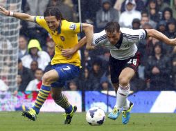 La escuadra de Arsene Wenger se quedó con sus primeras tres unidades en ala Liga Premier. EFE /