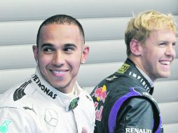 Hamilton conquistó su quinta pole de la temporada; Vettel toma su segunda posición con la seguridad del rendimiento de su Red Bull. AFP /