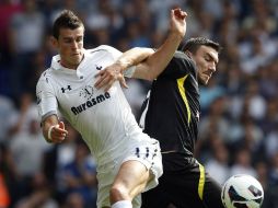 Gareth (i) no ha hecho ninguna declaración respecto a su salida de la Liga Premier. ARCHIVO /