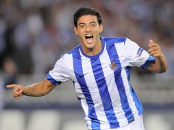 El atacante mexicano no tiene preferencia alguna de cara a la fase de grupos de la Champions League. AP /