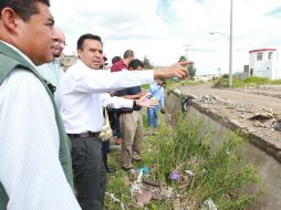 El alcalde de Zapopan, Héctor Robles, señaló que se planea la reubicación de mil 300 familias que viven en zonas de riesgo. EL INFORMADOR /