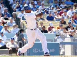 Puig (14) pegó batazo de vuelta entera, sin corredores en el camino cuando había un out en el episodio. AFP /