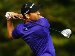 García acumula 194 golpes luego de tres recorridos. AFP /