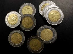 Las transacciones con la moneda mexicana se dan durante las 24 horas alrededor del mundo. ARCHIVO /