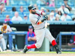 Mike Napoli ''desapareció'' la pelota en el noveno capítulo para darle a Boston la ventaja definitiva de 13-9. AFP /