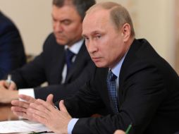El presidente Putin confía en que Siria aceptará el control internacional sobre sus arsenales químicos. AP /