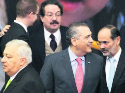 Emilio Chuayffet, el diputado Manlio Fabio Beltrones, y el líder nacional del PAN, Gustavo Madero, en la promulgación de la reforma. NTX /