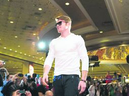 Saúl Álvarez se mostró relajado y sonriente ante las decenas de cámaras que buscaban retratar aspectos del jalisciense. ESPECIAL /