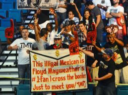 Los fanáticos le inyectan más sabor al encuentro entre el ''Canelo'' y ''Money''. AFP /