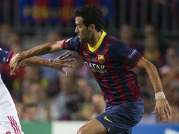 Busquets no alcanzó a estar listo para el próximo juego de liga de los culés. EFE /