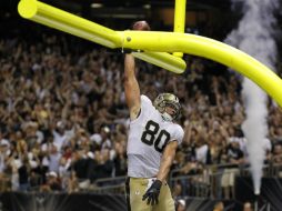Jimmy Graham realiza su característico festejo tras lograr una anotación frente a los Cardenales de Arizona. AP /