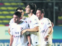 Juan Pablo Vigón, Giovanni León, Antonio Briseño y Hugo Ayala celebran al final del encuentro la clasificación rojinegra MEXSPORT /