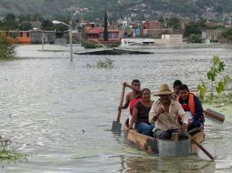 México recibió en Septiembre la misma cantidad de lo que llueve durante 3 años en los ríos más caudalosos del país. EFE /