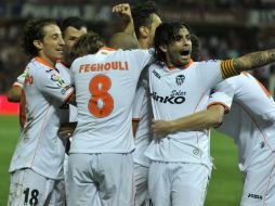 Guardado y sus compañeros celebran su segundo triunfo al hilo. EFE /