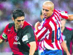 Clásicos apasionantes se vivieron a mediados de la década pasada. En la imagen, el ''Loquito'' García y el ''Bofo'' Bautista. EL INFORMADOR /