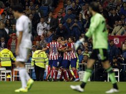 El Atlético derrotó a domicilio al Real Madrid y se mantiene invicto en La Liga. AP /