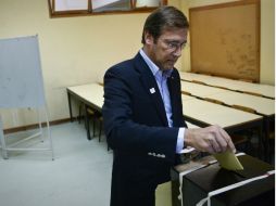 El primer ministro portugués Pedro Passos Coelho vota en las elecciones locales. AFP /