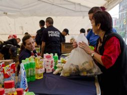 Entre las fuerzas armadas, la PF y el estado se han distribuido 411 mil 485 despensas a los afectados. SUN /