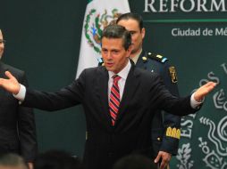 Enrique Peña Nieto anunció un programa para acelerar el crecimiento económico en el último tramo de 2013. ARCHIVO /