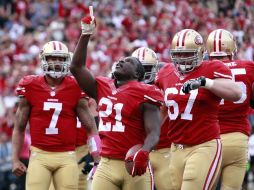 Frank Gore (21) festeja luego de una anotación en el partido entre San Francisco y los Texanos de Houston. AP /
