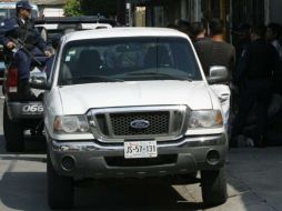 Elementos de la FGE acudieron al lugar donde localizaron a las víctimas. ARCHIVO /