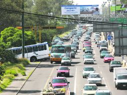 La carga vehicular del periférico. Sólo la 380 recorre 68 kilómetros diarios en cada vuelta a la vía. EL INFORMADOR /