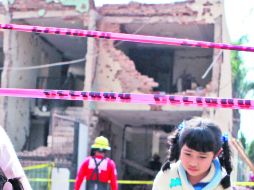 Prácticamente reducida a escombros terminó la finca en donde el grupo de presuntos delincuentes se resguardó durante la balacera. EFE /