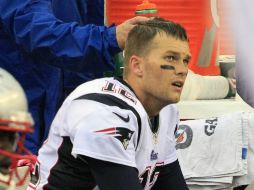 Manchado. Tom Brady y los Patriotas perdieron su invicto la semana pasada. AP /