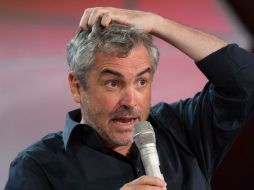 La pregunta fue tomada con humor por el cineasta quien dijo haber llevado cámaras al Soyuz y haber permanecido tres meses y medio allá. ARCHIVO /