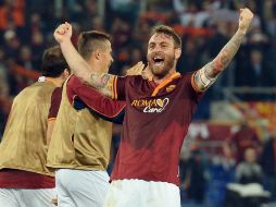 Los romanos son más líderes que nunca en el torneo italiano. AFP /