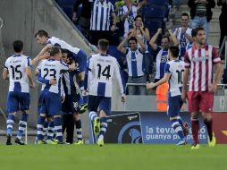 El Espanyol se repuso de una mala racha y de paso acabó con el invicto del Atlético de Madrid. AFP /