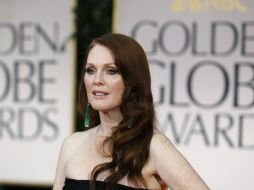 La actriz Julianne Moore, cumple la función de lo que sería una película erótica ''vintage''. ARCHIVO /