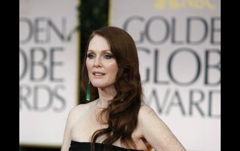 La actriz Julianne Moore, cumple la función de lo que sería una película erótica ''vintage''. ARCHIVO /