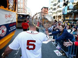 En un día cálido y soleado, la ruta del desfile incluía un tramo por el río Charles, entre Boston y Cambridge. AFP /