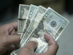 Se estima que el tipo de cambio se cotice hoy entre 13.07 y 13.15 pesos por dólar. ARCHIVO /