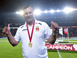El técnico de Morelia celebra las coronación de su equipo. MEXSPORT /