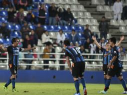 Jugadores del Querétaro celebran su triunfo. MEXSPORT /