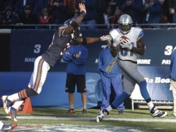 Johnson al momento de atrapar su segunda anotación, clave para la victoria de Detroit. AP /